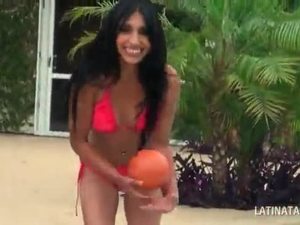Gorgeous latina takes off her swim suit by the pool