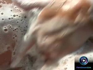 Maria belucci gets wet and soaped up with her luscious tits and cunt